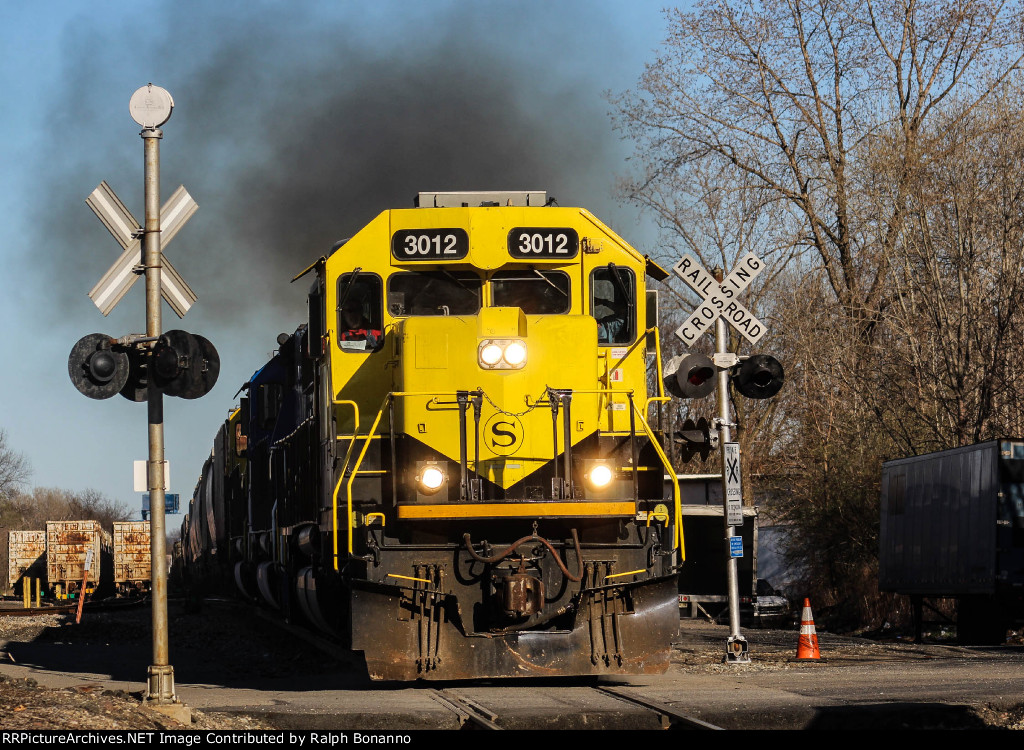 NYSW WS-3  crewman throws a switch to set over cars and an engine on the rarely(much less in daylight) used Lodi branch